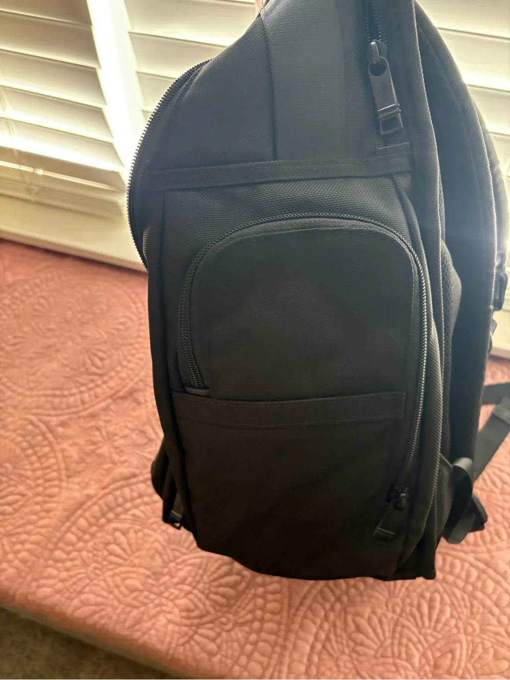 Tumi sleek backpack